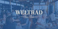 Kundenlogo WELTRAD am Fluss | Restaurant, Events & Quartier direkt an der Elbe